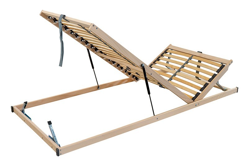 Nyitható lábvéggel rendelkező ágyrács, amely a dugattyú-mechanizmus segítségével a fej- és lábrészen is állítható a kényelem és a pihenés érdekében.