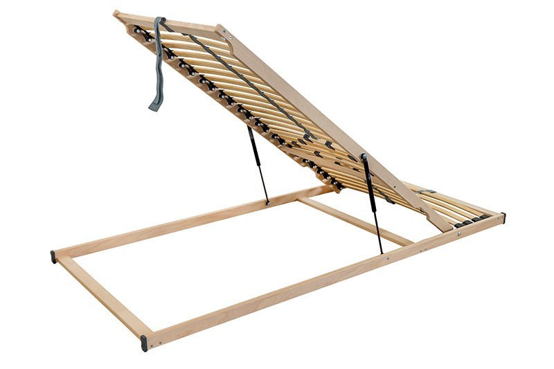 Dugattyú segítségével nyitható lábvéggel rendelkező ágyrács, amely a teljes ágyneműtartót hozzáférhetővé teszi. Az ágyrács textilfogantyú segítségével emelhető. A rugalmas és strapabíró rostok kettesével vannak elhelyezve a kaucsuktokokban.