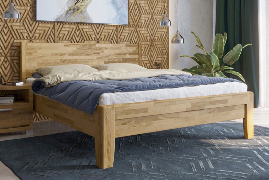 A robusztus, masszív Sion K1 ágy méltóságteljes központi eleme lesz hálószobájának, amely otthonosságot és kényelmet hoz magával.